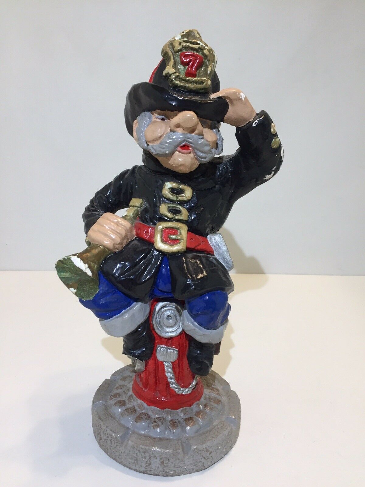 Fireman Sitting On Hydrant Figurine 11.5”