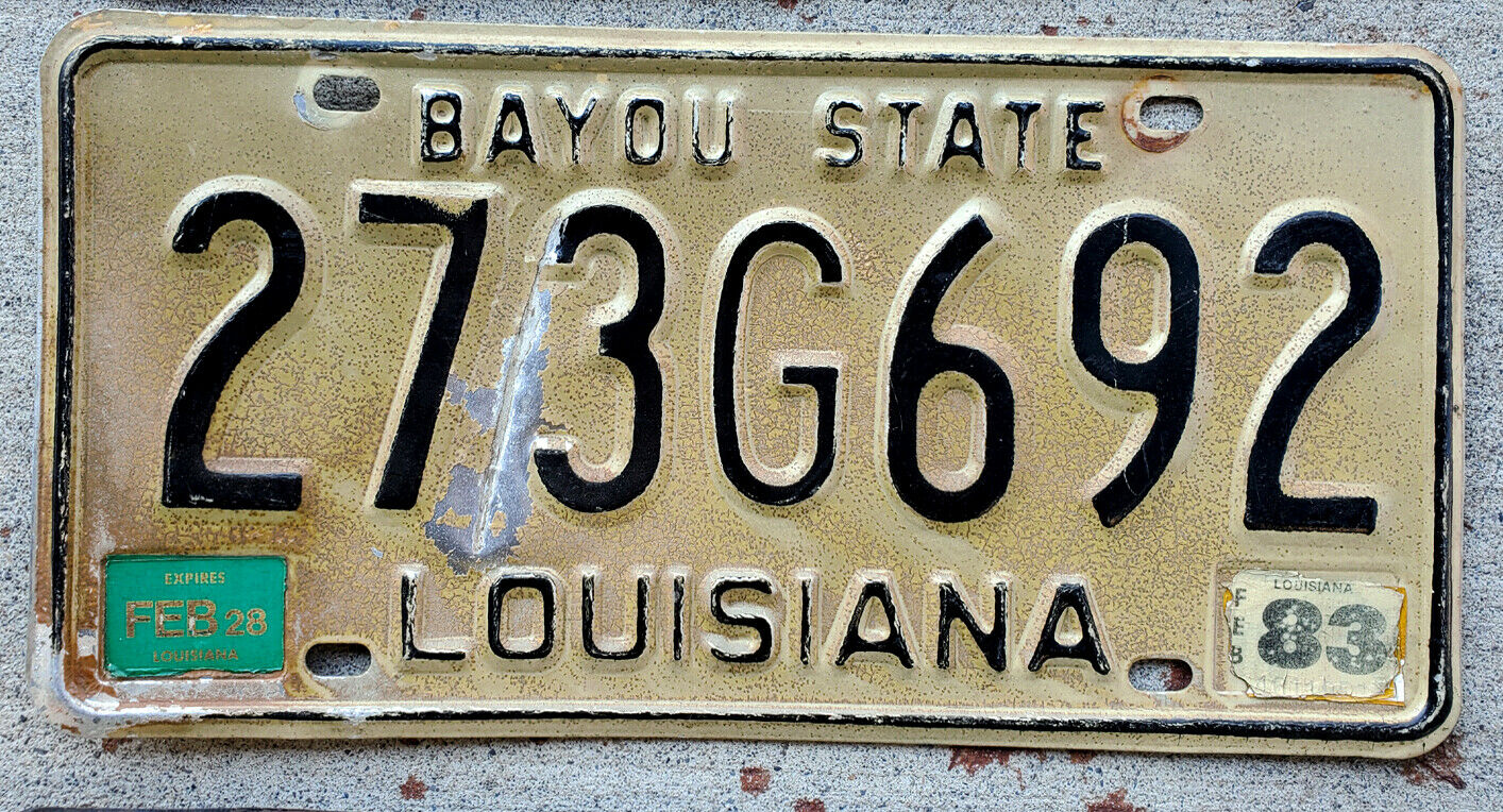 1977 Black On White Louisiana Bayou State License Plate With A 1983 Sticker